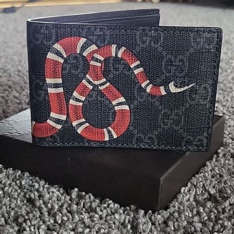 what does the gucci snake represent|authentic Gucci snake wallet.